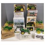 14 John Deere die cast tractors: most w/ boxes