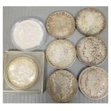 8 U.S. Morgan silver dollars: 1884, 1885, 1897-O,
