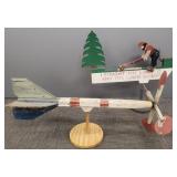 2 folk art whirlygigs on stands- 34" longer