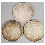 3 U.S. silver dollars: 1896 Morgan, 1922 Peace