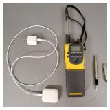 Group: earbuds, marine band radio, pen