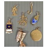 Seven- 14k gold charms: 6.6g total