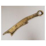 Brass Asian knife form- money?
