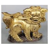 Asian carved wooden & gilt foo lion figure