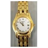 Gucci ladies watch: gold-tone stainless- Gucci ladies watch: gold-tone stainless-