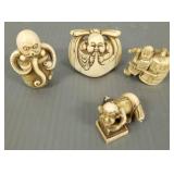 4 carved netsukes: 3 signed incl octopus 4 carved netsukes: 3 signed incl octopus
