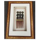 African carved wood figural comb in shadowbox African carved wood figural comb in shadowbox