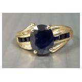 14k gold ring s/w Lg oval sapphire: 4.4g, size 8