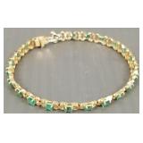 10k gold bracelet s/w oval emeralds: 7g, 7"L
