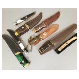8 knives w/ sheaths: 2 Smith & Wesson USA,
