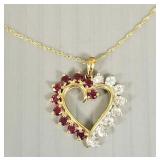 10k gold heart pendant s/w red & clear stones: