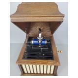 Antique Edison cylinder phonograph in oak cabinet