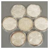 7 U.S. silver eagles: 1987, 1999, 2001, 2003,