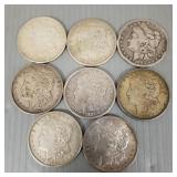 8 U.S. Morgan silver dollars: 1881, 1883 (as seen)