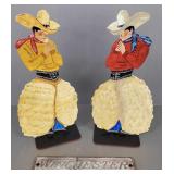 Painted metal cowboy bookends & a Winchester/