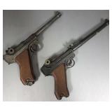 2 theatrical prop guns (1 missing parts)