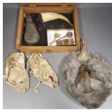 Case with Native American moccasins, powder