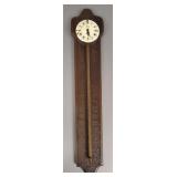 Antique style gravity wall clock w/ enameled dial-