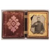 Antique cased photo of Civil War soldier w/ gun-