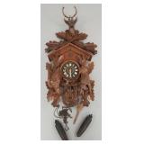Black Forest style carved wood cuckoo clock w/ two