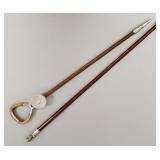 2 canes: bust of Hippocrates ? & foldable shooting