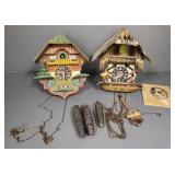 2 cuckoo style clocks- 10" taller (as seen-