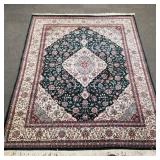 Handmade oriental pattern wool carpet with floral