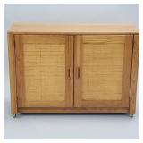 Oak cabinet with woven front & back (on castors)