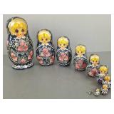 Signed Russian wooden nesting doll-