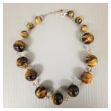 Silver & tiger eye bead necklace 3/4" largest bead