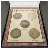 5 Morgan U.S. silver dollars: 1879, 1888, 1891,