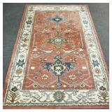 Oriental pattern area rug- 95" x 60"