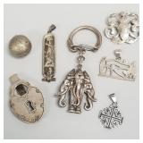 7 silver pendants, etc some marked sterling