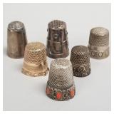 6 thimbles: one 14k gold & five silver- 3.1g gold,