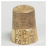 14k gold thimble: 4.4 grams