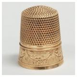 10k gold thimble: 2.8 grams