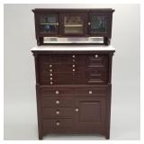 Antique painted oak dental cabinet with porcelain