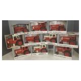 10 boxed International Harvester red tractors-