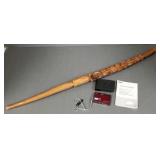 Nikon Coolpix camera & a carved wood figural cane-