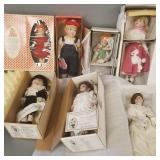 8 porcelain collector dolls- 7 with original boxes