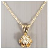 Diamond pendant on 14k gold chain- 0.8g total,