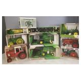 10 boxed John Deere, etc tractors & implements-
