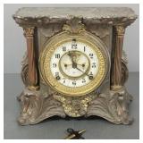 Ansonia open escapement clock in ornate metal case