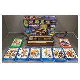 Vintage Intellivision game system with 8 games