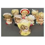 8 vintage head vases incl Jackie O in mourning,