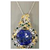 Ornate carved lapis floral pendant on chain s/w