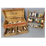 Large group fishing lures on wood stand &
