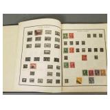National stamp album w/ some stamps incl