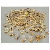 Group over 80 goldtone rings s/w tiger