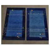 2 handmade blue wool rugs- approx. 5